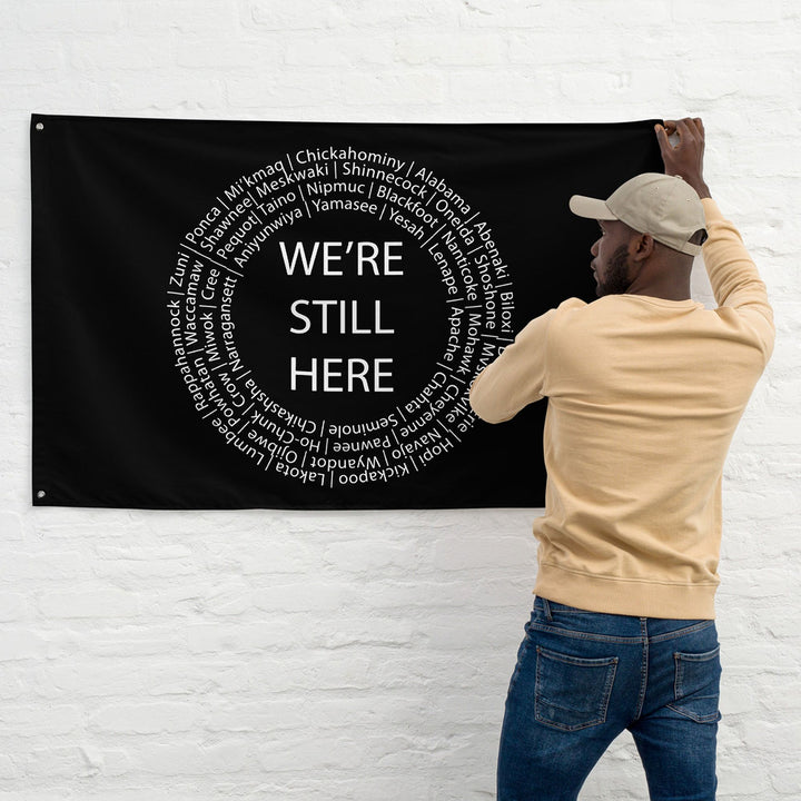 We're Still Here Black Wall Hanging by Chained Dolls
